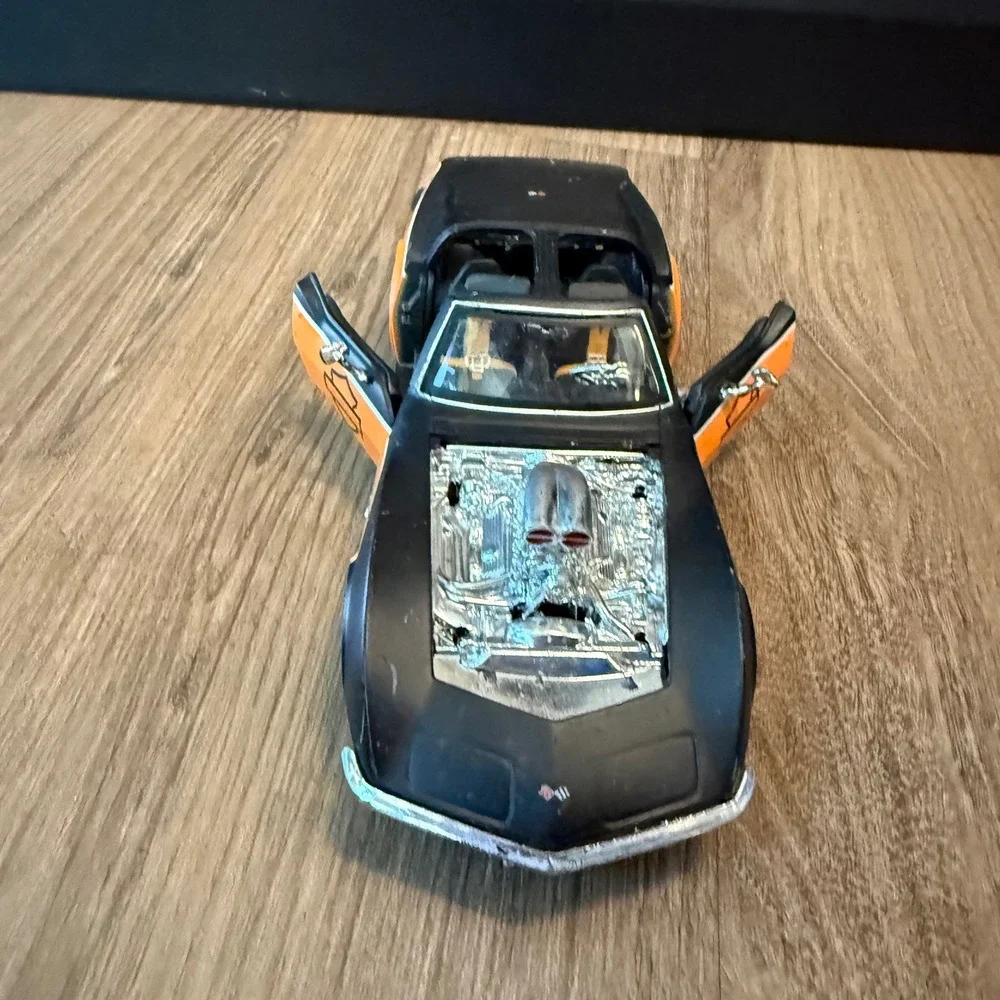 Maisto 1970 Chevrolet Corvette Harley-Davidson 1/24 Diecast Car Black Orange